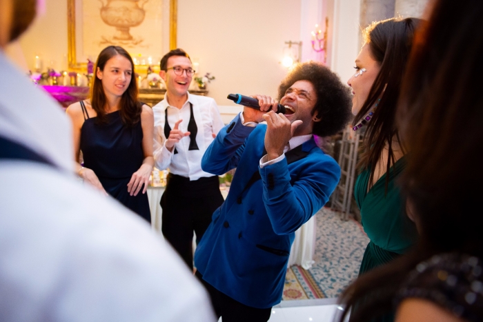 Singer in the crowd at Wedding